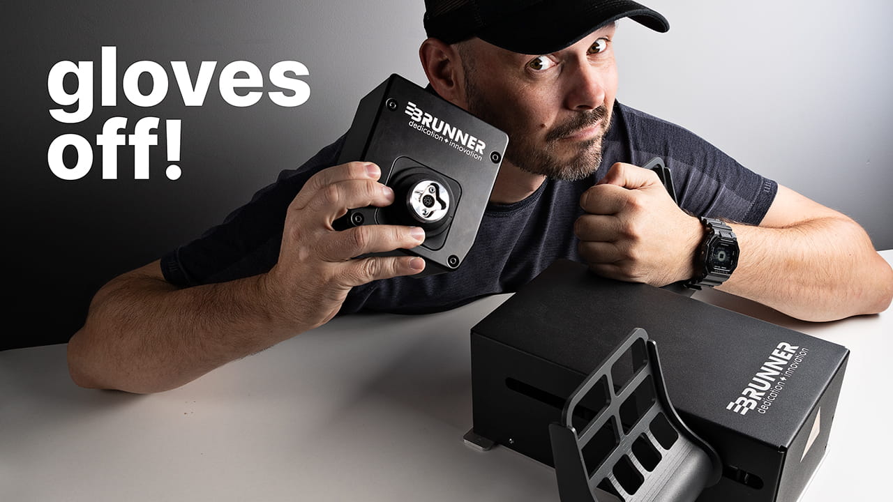 Man gholding the new Brunner FFB-G Joystick & Rudder Pedals