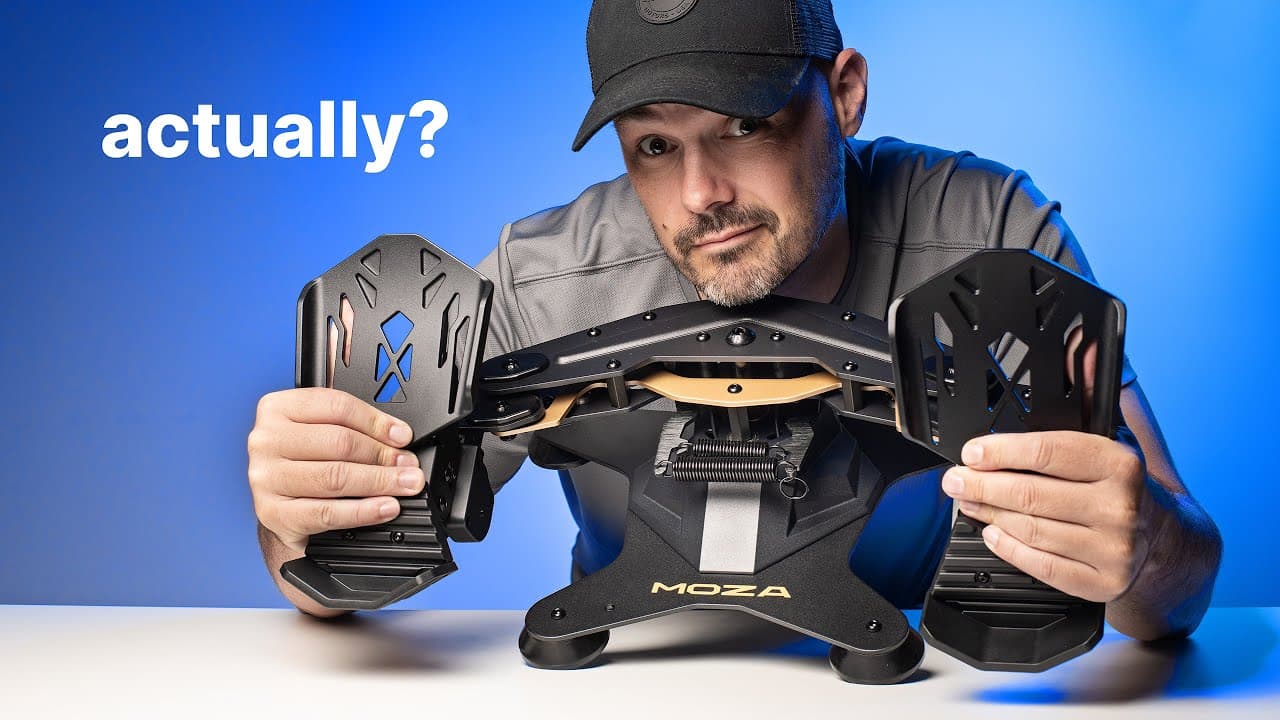 g-loc media holding the Moza MRP Rudder Pedals